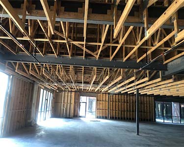 The framing of an unfished commercial building — commercial building inspector in Conroe, Texas.