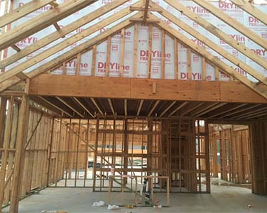 The framing of a house during a pre-drywall home inspeciton in Conroe, Texas.